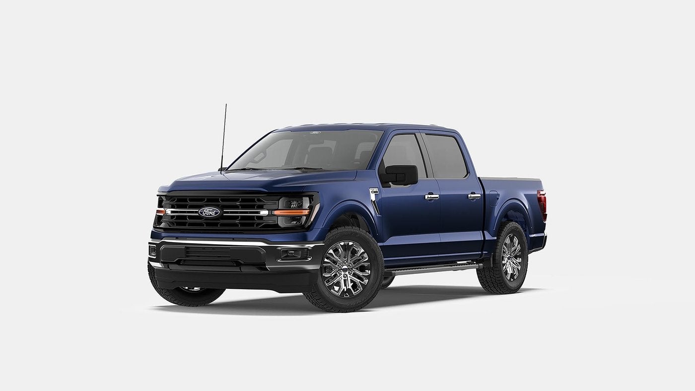 Blue Ford F-150 XLT SuperCrew pickup, front three quarter view on a light gray background, Farmington MO