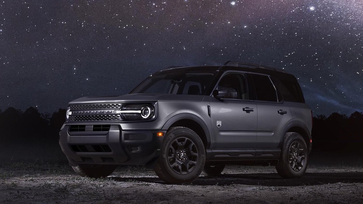 Dark gray Ford Bronco Sport parked under a starry night sky, Farmington MO