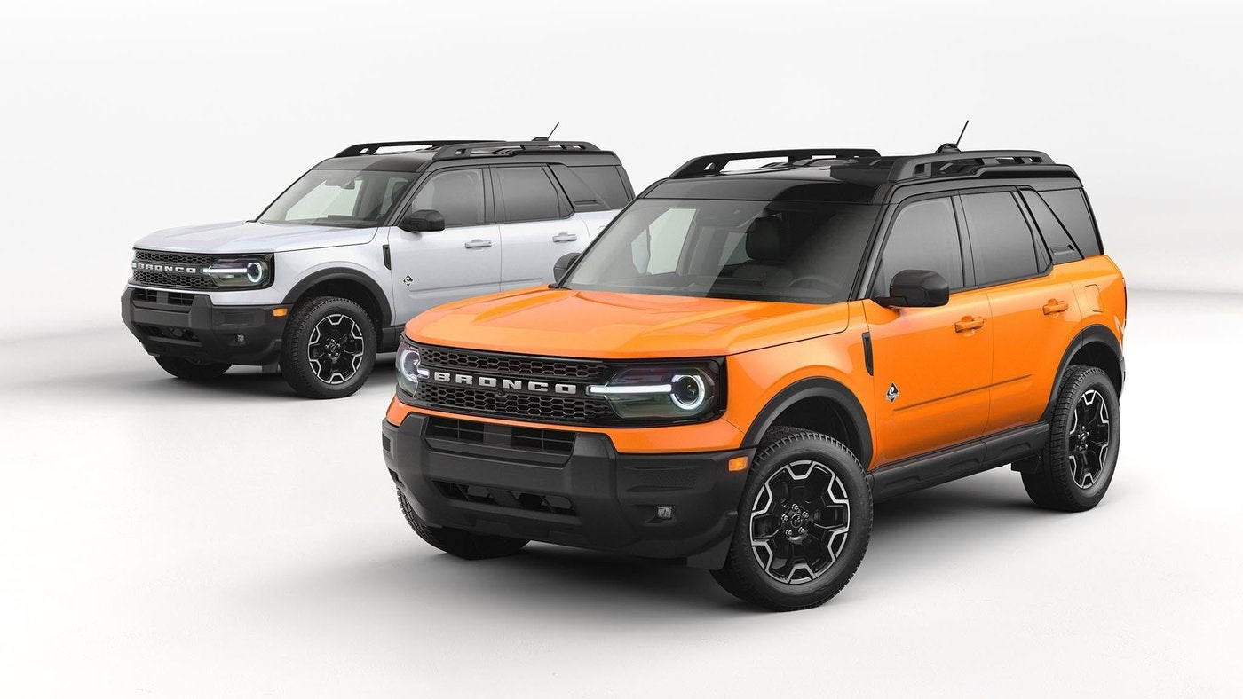 Orange and white Ford Bronco Sport SUVs side by side, compact SUV choices for tax refund shoppers in Farmington MO