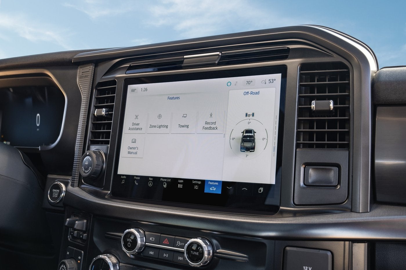 Ford F-150 center touchscreen showing the features menu, where software updates show up, Farmington MO