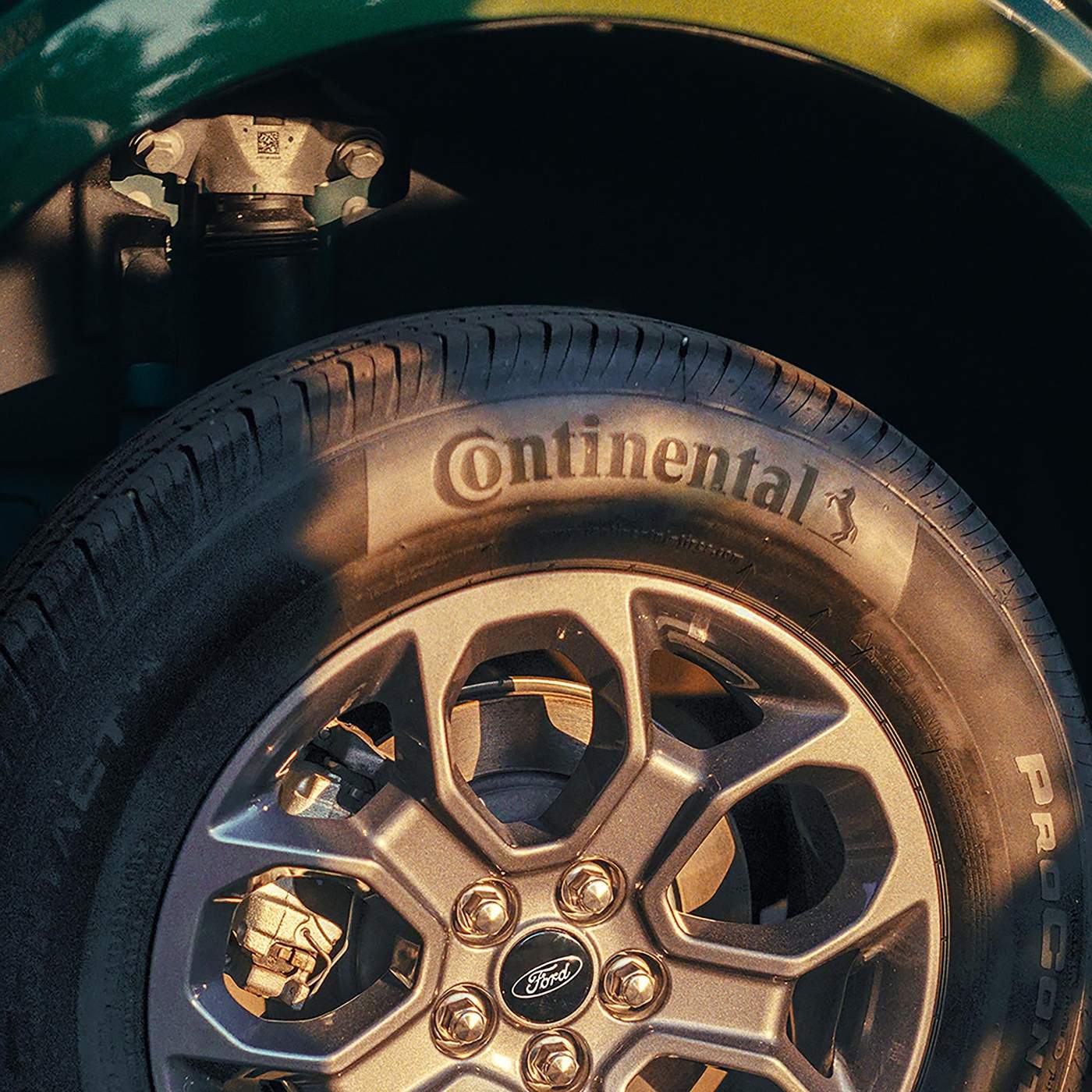 Close up of a Ford Maverick wheel and tire tread Close up of a Ford Maverick wheel and tire tread, the wear to check after pothole season in Farmington MO